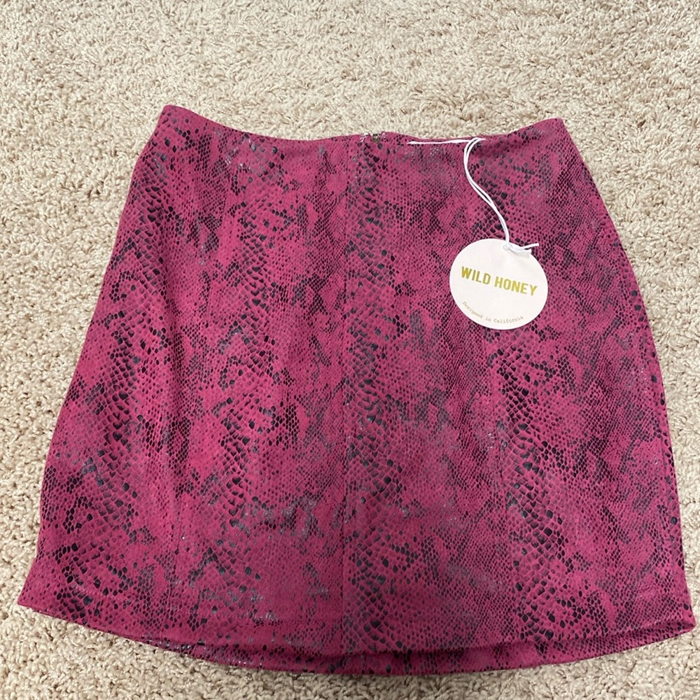 Pink and black snake print mini skirt. Brand new perfect condition.